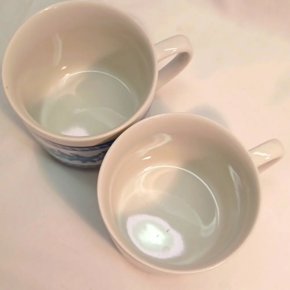 Set of 2 Williams-Sonoma Blue and White Leaf Band Mugs.